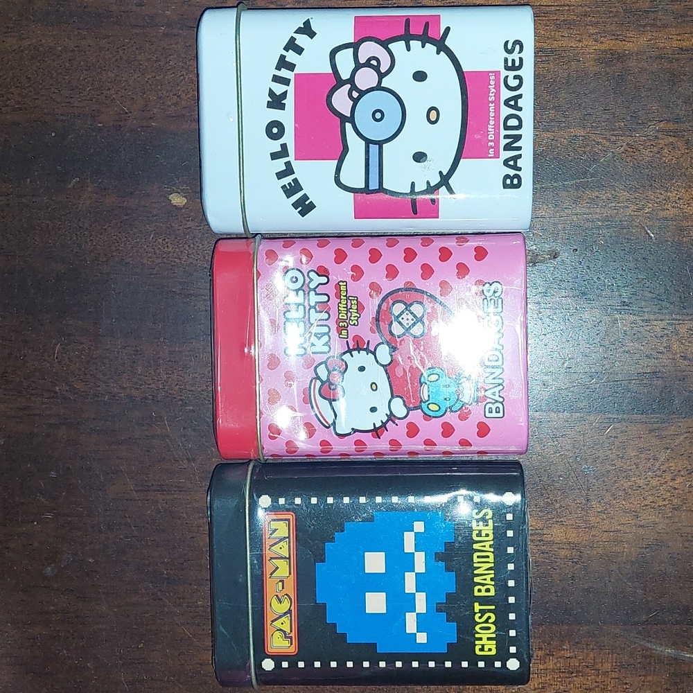 2Hello Kitty & PacMan bandaid w/collection tin.